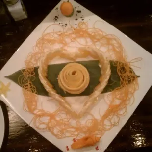 Chef made a heart out of an orange for our friend's anniversary