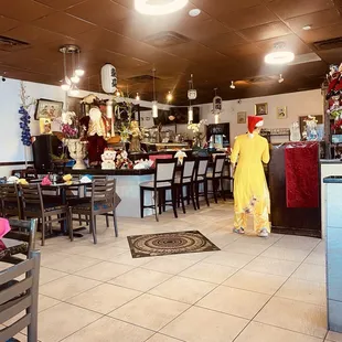 Staff were dressed very festive for the holiday and very attentive .