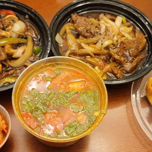 Bulgogi, beef with black bean sauce, kimchi, Tom yum gai soup and crab rangoon