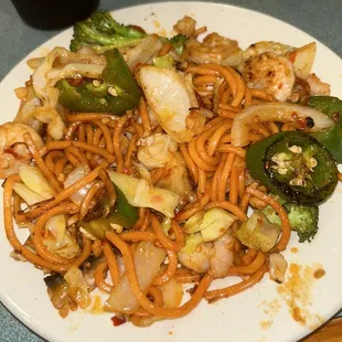 a plate of noodles and vegetables