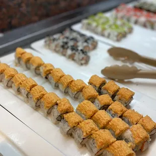 a variety of sushi rolls