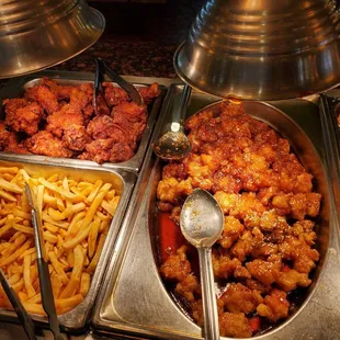 a variety of food items in a buffet