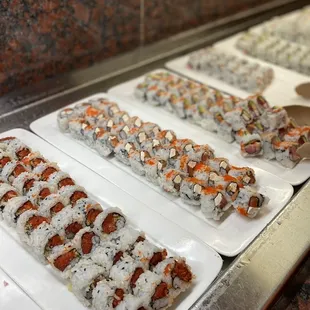 a variety of sushi rolls