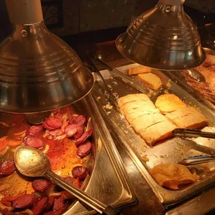 a variety of food items in a buffet