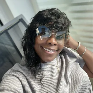 Charnelle E.