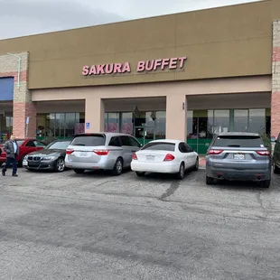 cars parked in front of the restaurant