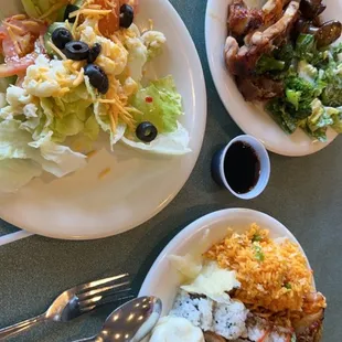 Salad, beef broccoli, roast chicken, sushi and chowmein plate