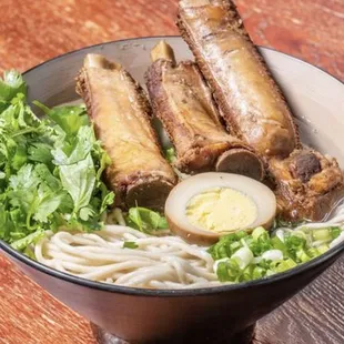 a bowl of ramen with a boiled egg
