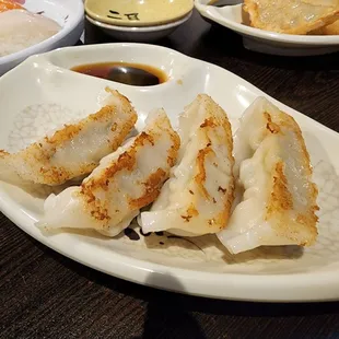 a plate of dumplings