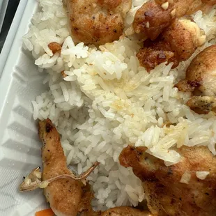 chicken and rice in a styrofoam container