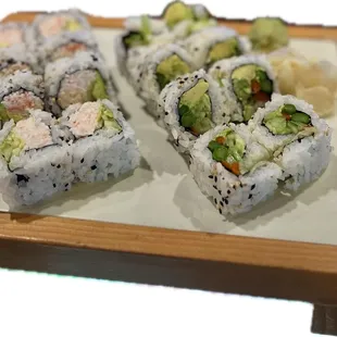 two pieces of sushi on a plate