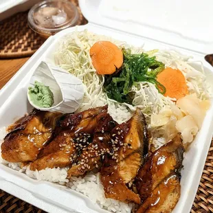 $16.99 Unagi Don (eel rice dish). Comes with cabbage salad, rice and soup.