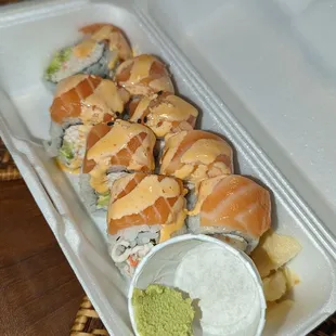$8.99 Las Vegas Roll to-go. A cup with wasabi is a nice plus!