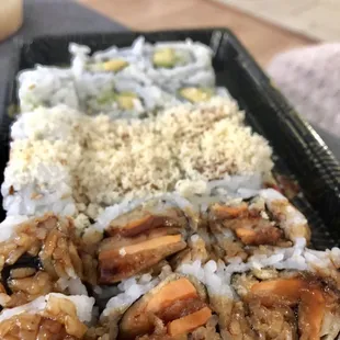 a plate of sushi and rice