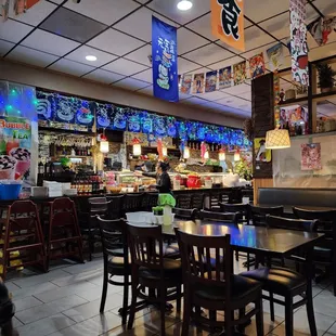 Dining area with a view of the sushi bar.