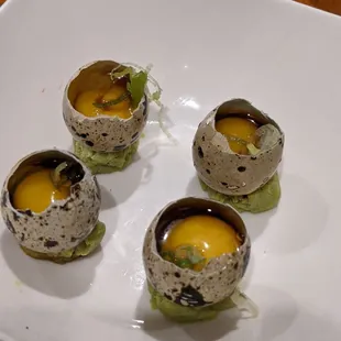 Quail eggs! I love a few drops of ponzu with these.