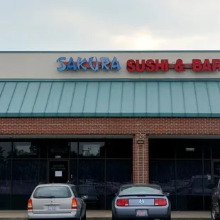 cars parked in front of the restaurant
