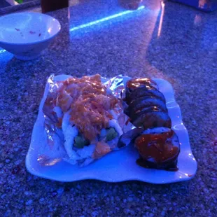 a plate of sushi on a table
