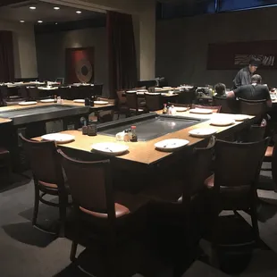 The empty, sad dining room. (And the hardworking grill master)