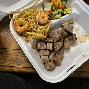 a take out container of food