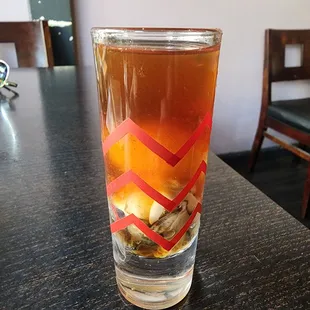 Oyster shooter with quail egg.