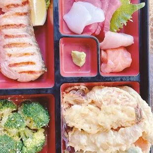 a bento box of food