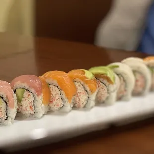 a row of sushi rolls