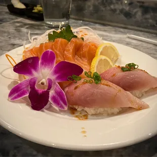 Yellowtail sushi and salmon sashimi