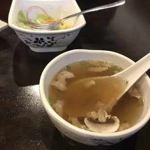 Clear onion soup and a salad