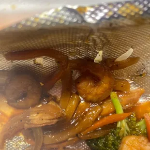 These baby tiny shrimp in the soba noodle shrimp, that taste &amp; look like garbage dirt cheap, frozen convenience store. Inedible.
