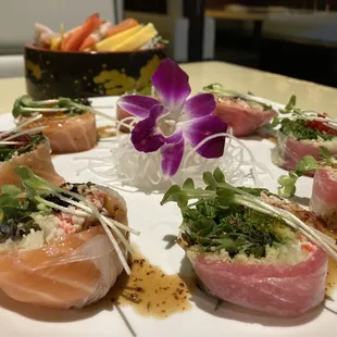 BTS roll with chirashi bowl in the background