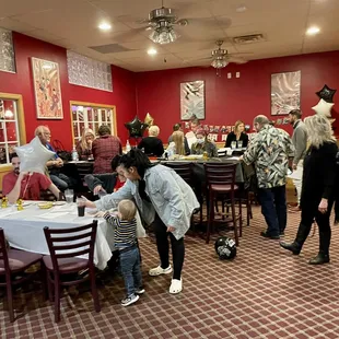 a group of people in a restaurant