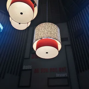 two lamps hanging from the ceiling
