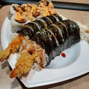 a plate of food with rice and shrimp