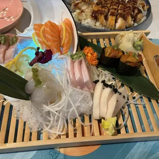 Shasimi combo and fresh uni. Uni is $16 and shasimi combo has 5 different type of fish for $32.