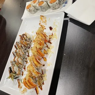 a plate of sushi on a table