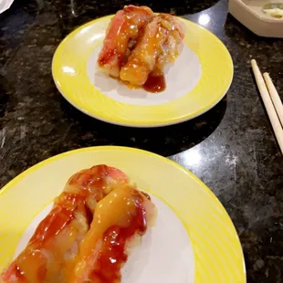 three plates of food on a counter