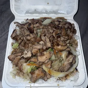 a close up of a take out box of food