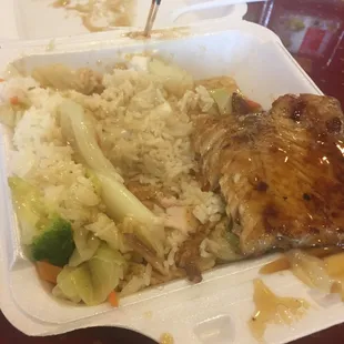 Sure it's half eaten, but it didn't look any better when I started. (Salmon teriyaki)