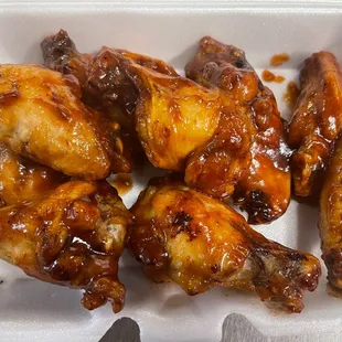 chicken wings in a styrofoam container