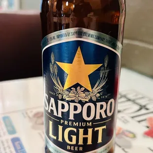 a bottle of sapporo light beer