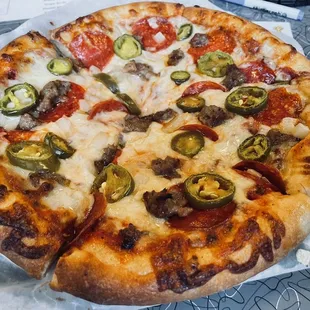 a pepperoni and jalapeno pizza