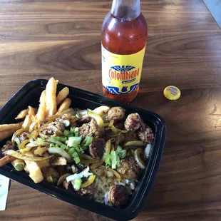 Brazilian Sausage &amp; Rice and a Colombiana soda.