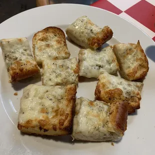 Garlic bread- has chunks of garlic under the cheese but was very hard