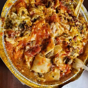 Grease obvious in the lasagna when digging to the bottom where gravity took it.