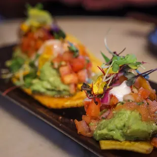 Shrimp tostadas with plantain chips to make them gluten free.