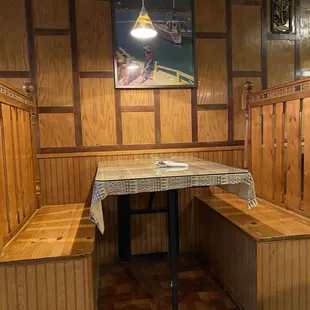 a table and benches in a restaurant