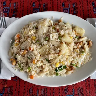a plate of rice and vegetables