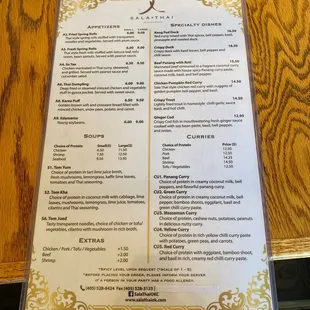 a menu on a wooden table