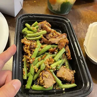 Sixteen bucks worth of duck and raw green beans.